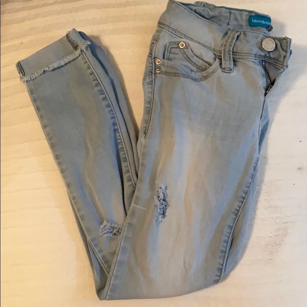 Distressed light wash jean